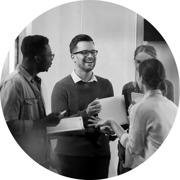 A group of business people having a happy conversation